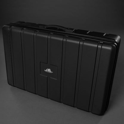 Black hard-shell travel case on a dark background